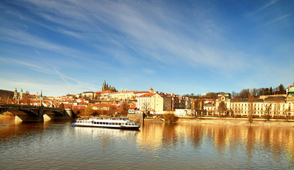 Fototapeta na wymiar iew on St. Vitus Cathedral and Prague Castle across Vltava river