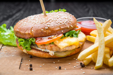 Delicious burgers with beef, tomato