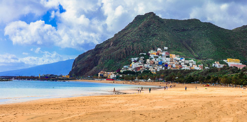 Fototapeta na wymiar Tenerife holidays and landmarks - beautiful beach las Teresitas, near Santa Cruz. Canary islands