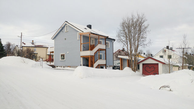 Blue House In Winter Weather