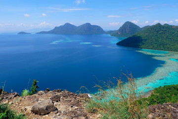 The majestic view of corals reef and islands seen from the top of mountain at Bohey Dulang Island, Sabah, Malaysia.