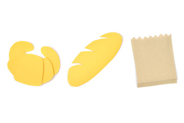 Bread and croissant paper cut on white background - isolated