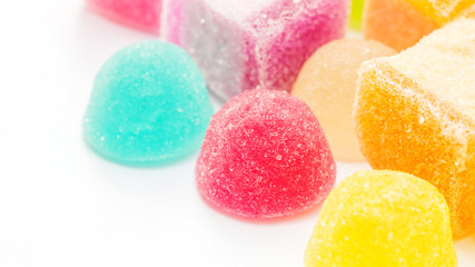 Colorful gummy candy on a white background.