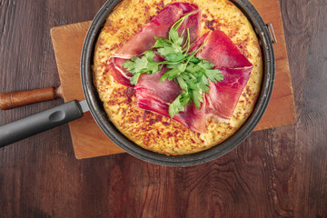 Overhead photo of Spanish tortilla with copy space