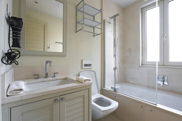 Fototapeta na wymiar Interior of a bathroomwith window in a private studio