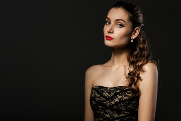 beautiful curly woman in black dress