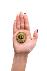 Hand holding golden Bitcoin, coin virtual money