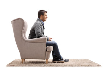 Man sitting in an armchair