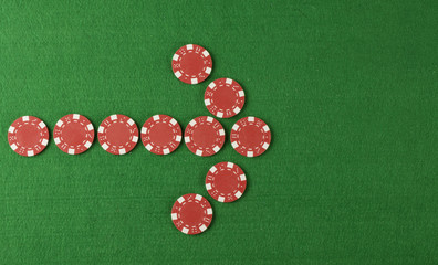 chips arrow pointing above green cloth