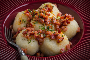 Potato dumplings with bacon.