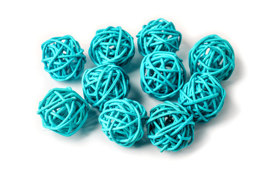 Blue rattan light balls on white background. Creative decoration concept for Christmas celebration and Holiday.