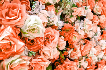 Close-up of orange rose flowers background for Valentine's Day decoration.