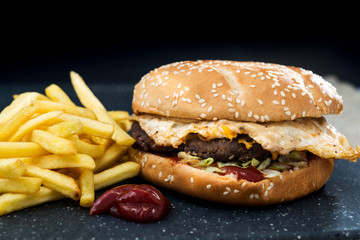 Cheese burger - American cheese burger with Golden French fries