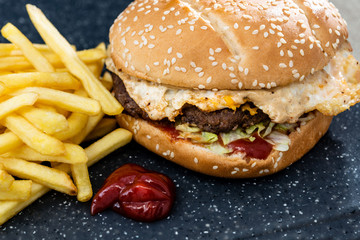 Cheese burger - American cheese burger with Golden French fries