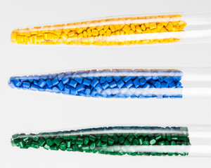 Obraz premium Polymeric dye. Plastic pellets. Colorant for plastics. Pigment in the granules.