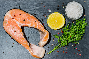 healthy food, seafood - steak fresh salmon with a slice of lemon