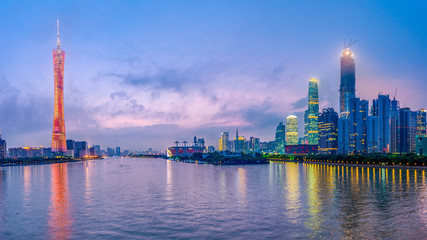 Fototapeta na wymiar Guangzhou, China skyline on the river at dusk.