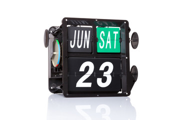 Mechanical calendar retro date 23 June, 2018 on isolated United Nations Public Service Day.