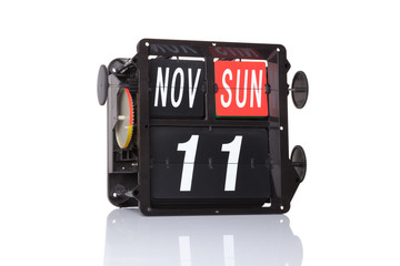 Mechanical calendar retro date 11 November, 2018 on isolated Remembrance Day.