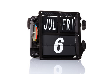 Mechanical calendar retro date 6 July, 2018 on isolated National Fried Chicken Day.