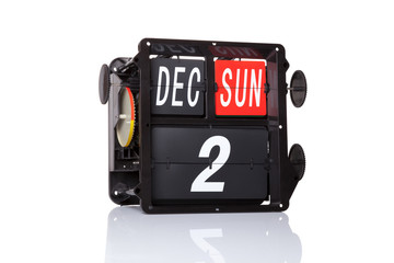 The mechanical calendar retro date 2 December, 2018 on isolated Happy Hanukkah.