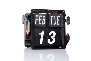 Mechanical calendar retro date 13 February, 2018 on isolated World Radio Day.