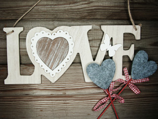 valentine's day love holiday concept hearts on old wooden background