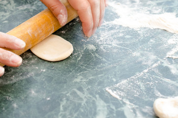 The process of making delicious home-made dumplings with meat.