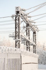 Glass insulator on the power line. Insulator of electrical high-voltage lines