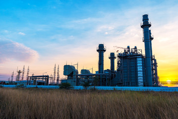 Fototapeta na wymiar Oil refinery industry at sunrise, Oil refiner Industry background concept.