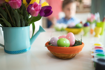 Bunch of spring tulips flowers with easter eggs