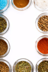 Different spices in bowls on table