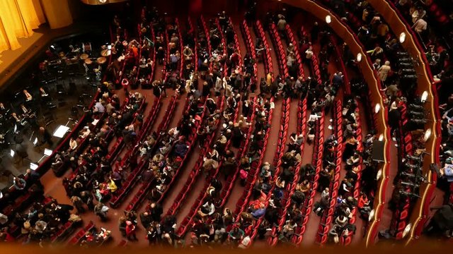 NEW YORK, USA- DECEMBER 2017: top view of the spectators of the theater leaving the auditorium after the performance