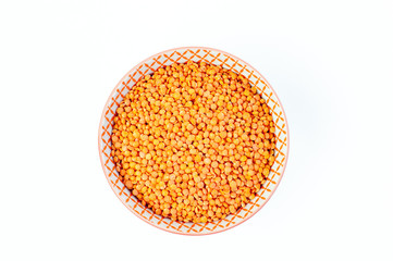 Red lentils in a bowl, top view