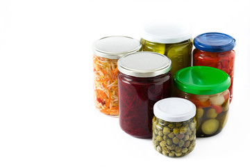 Fermented preserved vegetables in jar isolated on white background. Copyspace

