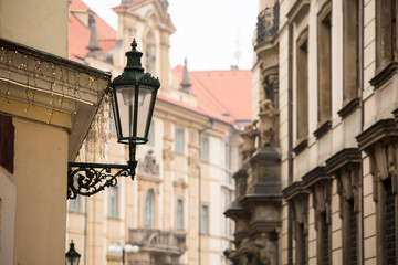 Fototapeta na wymiar Retro lantern in Prague street, Czech Republic