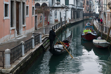 Obraz na płótnie Canvas Gondola ride in Venice canal , Italy