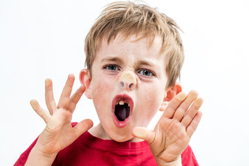 screaming cheeky kid crushing his nose to window for misbehavior