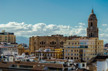 Fototapeta na wymiar Panoramic views of the buildings and flats of the city center of Malaga, Andalusia, Spain. Beautiful urban landscape in a clear day.