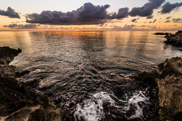 Big volcanic rocks in sunset lights in San-Andres island, Caribbean.