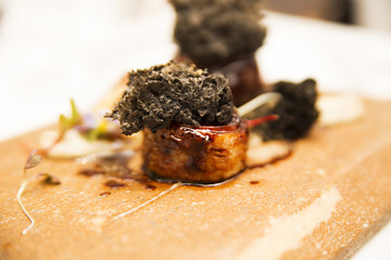 decorated appetizer from vagatables and nuts