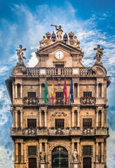 Fototapeta na wymiar City Hall, Pamplona (Iruña), where the running of the bulls during the San Fermin festival is kicked off, Pamplona (Iruña), the historical capital of Navarre, Spain. 