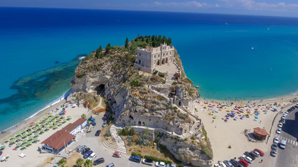 Panoramic aerial view of Tropea coastline and beaches in summer, Calabria - Italy