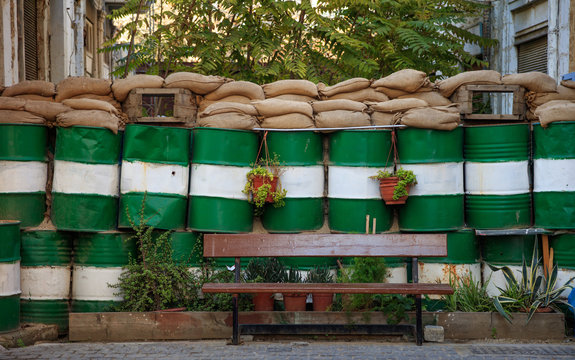 Green line at Nicosia, Lefkosia, Cyprus. Barrels forbidden the way through. Close up view, details.