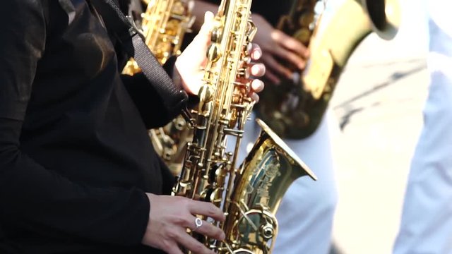 play on saxophone