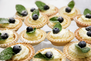 dessert. Baskets with cream and fresh berries
