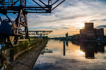 Industrial harbour area in Karlsruhe, Germany during sunset