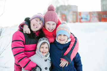  four joyful sisters on  street in   winter.
