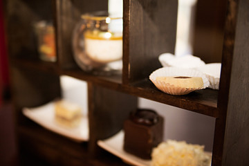Assorted snacks on a wooden stand in a restaurant