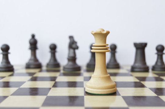 white queen on chessboard